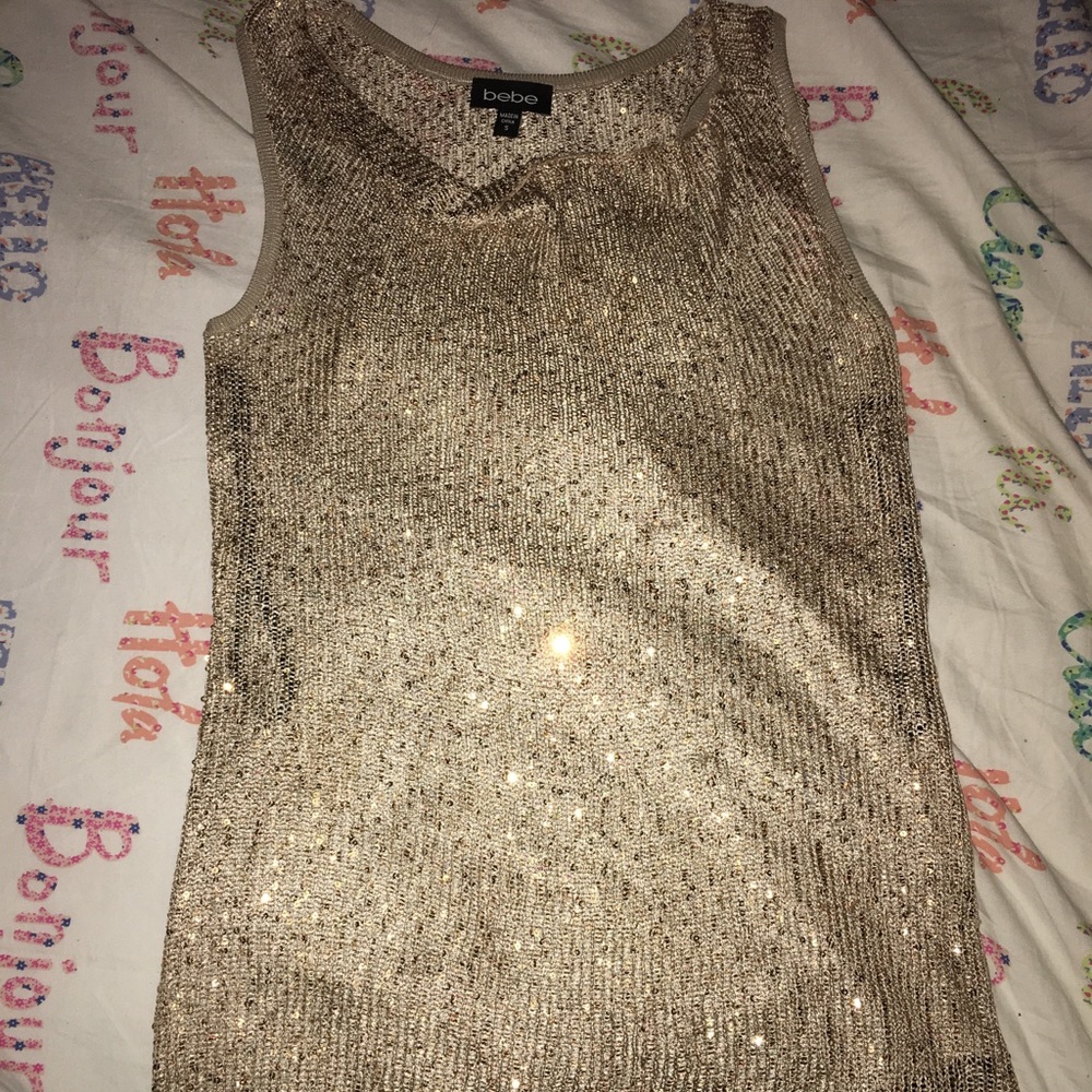 A gold shimmering Bebe small